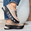Skórzane sneakersy Filippo DP6427 na nodze – stylizacja na co dzień, sneakersy noszone przez modelkę w dżinsach.