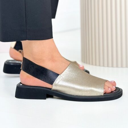 Buty Verano złote na niskim obcasie – bokiem, widoczna tekstura skóry i czarny elastyczny pasek